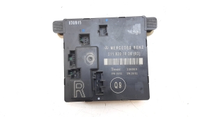  Rear side door control unit 